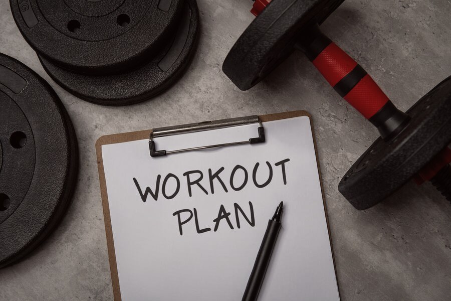 A written workout plan on a clipboard
